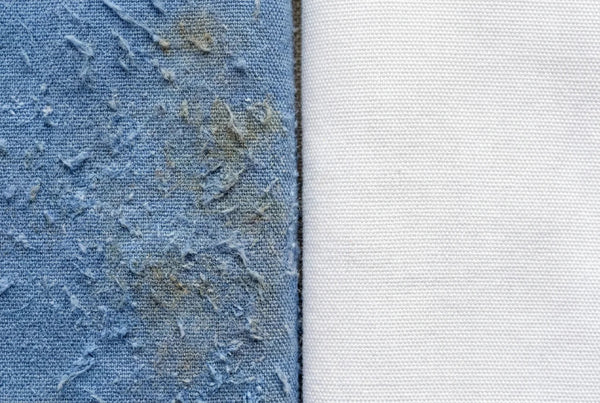 Close-up fabric comparison cheap vs premium scrub fabric texture